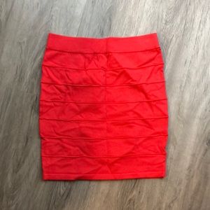 Coral colored mini skirt